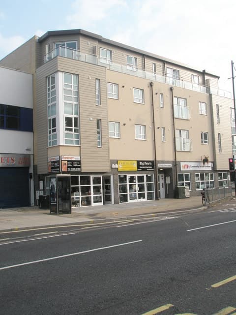A street of shops on West Street, Fareham town centre — representative image of the town, not a specific chip shop